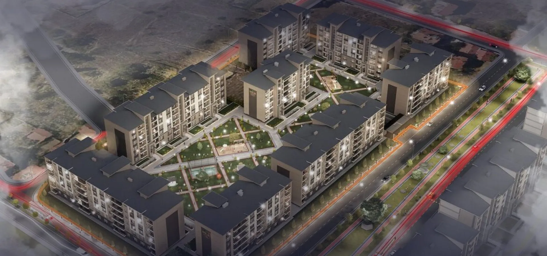Gece havadan render: bulvar boyunca dizilmiş konut blokları ve peyzajlı iç avlu